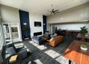 Thumbnail 12 of 55 - a living room with couches and chairs and a table