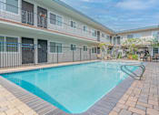 Thumbnail 31 of 35 - A swimming pool in a residential area.