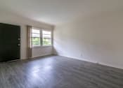 Thumbnail 6 of 15 - Living area with window view
