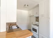 Thumbnail 6 of 10 - Kitchen with nw counters and appliances