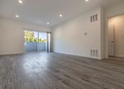 Thumbnail 7 of 24 - Living room and balcony