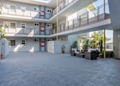 Thumbnail 18 of 24 - Center of building Interior with seating area