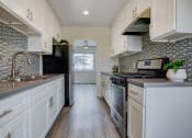 Thumbnail 6 of 15 - Kitchen with upgraded appliances