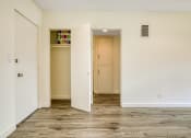 Thumbnail 8 of 15 - bedroom with view of closets