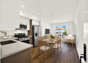 Thumbnail 22 of 23 - A modern kitchen with a dining table and chairs.