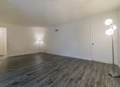 Thumbnail 9 of 15 - A room with a grey floor and white walls.