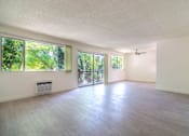 Thumbnail 5 of 9 - Living room with balcony
