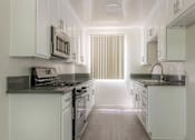 Thumbnail 3 of 9 - Kitchen with new counters and appliances