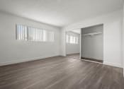 Thumbnail 50 of 64 - Empty room with wooden floor and white walls at Sunset Square, West Covina, 91790