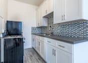 Thumbnail 11 of 14 - Kitchen with new counters and appliances