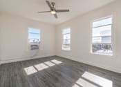 Thumbnail 13 of 14 - Living area with 3 large windows