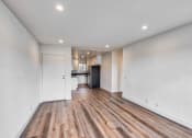 Thumbnail 9 of 30 - Dining room with kitchen in background