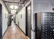 Thumbnail 8 of 40 - Corridor with view of mailboxes