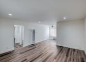 Thumbnail 6 of 13 - Living room with hard wood like floors