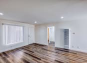 Thumbnail 7 of 13 - view of living room and blinds on window