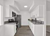 Thumbnail 12 of 64 - a kitchen with white cabinets and stainless steel appliances at Sunset Square Apartments, West Covina, California, 91790