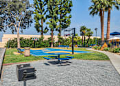 Thumbnail 34 of 55 - Basketball court at Serrano Apartments, California