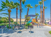 Thumbnail 40 of 55 - Park and bbq area at Serrano Apartments, West Covina, CA, 91790