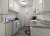 Thumbnail 6 of 25 - Kitchen with new counters and appliances