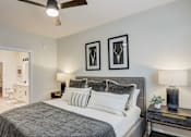 Thumbnail 36 of 45 - a bedroom with a large bed and two framed pictures on the wall in Asheville NC