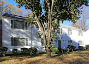 Thumbnail 11 of 14 - Exterior view of Apartments with white siding
