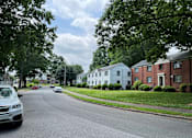 Thumbnail 9 of 14 - a row of houses on a street