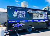 Thumbnail 44 of 45 - a voodoo rox food truck parked in a parking lot