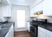 Thumbnail 8 of 36 - Fully equipped kitchen  at Huntington Apartments, Morrisville, 27560