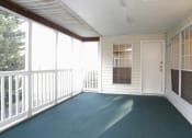 Thumbnail 17 of 36 - Screened porch within a unit  at Huntington Apartments, North Carolina, 27560