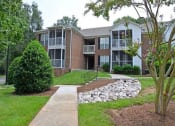 Thumbnail 27 of 36 - Walkway view  at Huntington Apartments, Morrisville, North Carolina