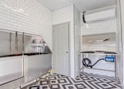 Thumbnail 21 of 25 - Two-Bedroom Garden-Style Apartments In Weaverville, NC - Highline North - Pet Washing Station With A Large Bath And Blow Dryer Table