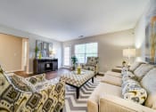 Thumbnail 5 of 20 - Large Living Room with Sofa, 2 chairs, Ottoman Coffee Table, Entertainment Stand, and Patio Door