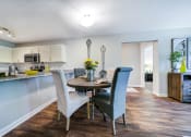 Thumbnail 4 of 20 - Dining Area with Table and 4 chairs visible from the kitchen area