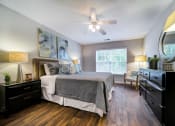Thumbnail 6 of 20 - Spacious Bedroom with Queen Bed, Nightstands, Dresser and Corner Chair