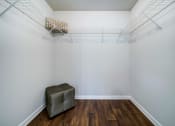 Thumbnail 7 of 20 - Large Walk In Closet with Shelving