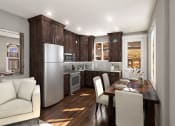 Thumbnail 12 of 26 - Kitchen With Dark Wood Cabinetry, Sleek Appliances, and Dining Area at Moenave Townhomes in Springdale, Utah