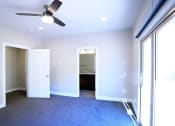 Thumbnail 22 of 26 - Sliding Door in Bedroom Space with Light Fixture, Bathroom at Moenave Townhomes in Springdale, Utah
