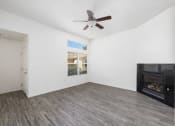 Thumbnail 14 of 49 - Firepit, window and ceiling fan at Lotus Villas, Bakersfield