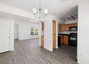 Thumbnail 17 of 49 - Kitchen with dining area at Lotus Villas, Bakersfield, CA, 93312