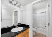 Thumbnail 21 of 49 - Bathroom with white interiors at Lotus Villas, Bakersfield
