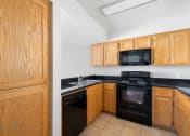 Thumbnail 31 of 49 - Kitchen with Appliances at Lotus Villas, Bakersfield, CA, 93312
