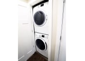 Thumbnail 23 of 26 - Stacked Washer and Dryer In-Unit at Moenave Townhomes in Springdale, Utah