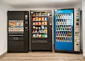 Thumbnail 17 of 22 - Vending machines in the building for convenient snacking and late-night nibbles.