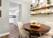 Thumbnail 14 of 22 - Convenient dining area offset from the kitchen, offering a functional and flexible layout.