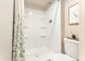 Thumbnail 6 of 22 - Full-sized walk-in fiberglass showers.