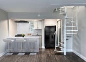 Thumbnail 1 of 9 - Furnished Townhome Kitchen