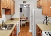 Thumbnail 4 of 13 - Kitchens provide plenty of storage and spacious countertop space.