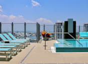 Thumbnail 3 of 35 - Our pool offers endless views of downtown Tampa, FL.