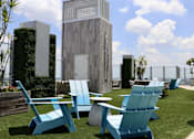 Thumbnail 6 of 35 - Lounge on our Sky Deck rooftop amenity.
