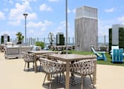 Thumbnail 4 of 35 - Grill out or relax on our Sky Deck rooftop